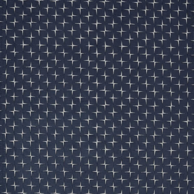 Midnight navy woven fabric with small silver star-cross motifs and subtle texture