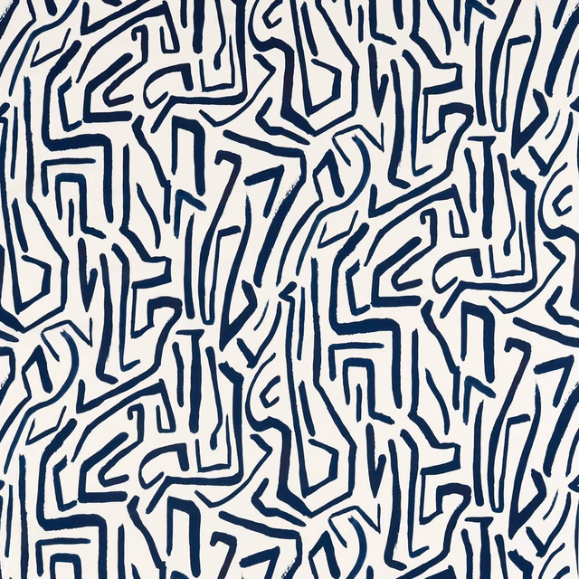 Cream fabric with dense dark ink-blue angular maze lines in a geometric repeat