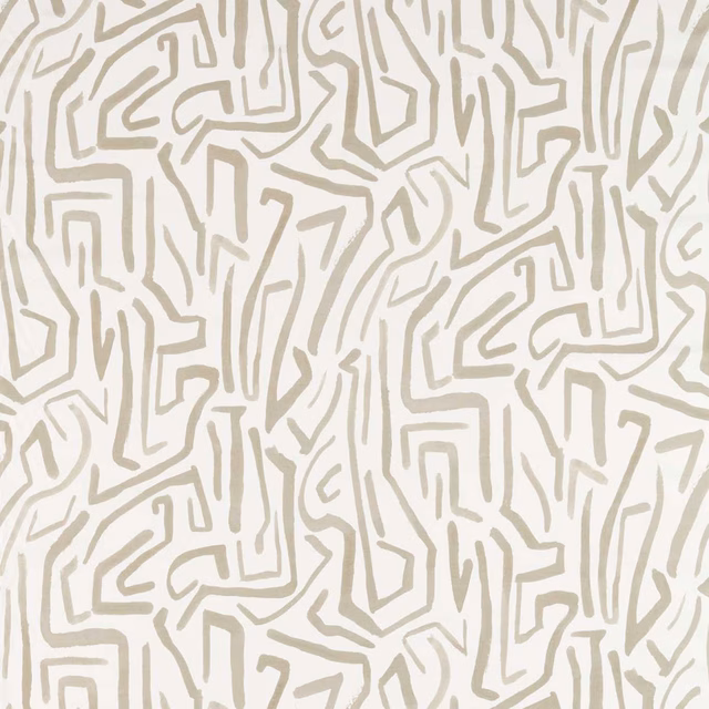 Ivory fabric with muted stone maze-like lines in an irregular geometric weave