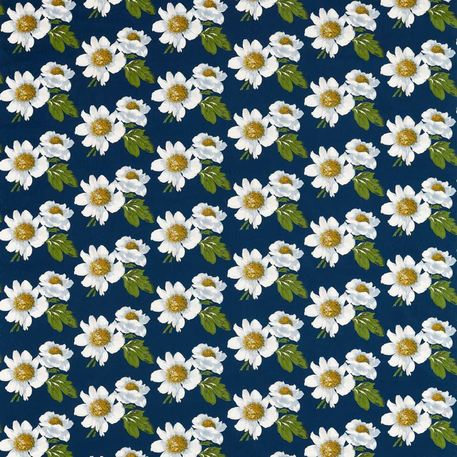 White daisies with yellow centres and green leaves on a deep navy ground