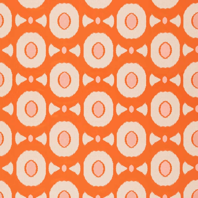 Clementine-orange geometric textile with cream discs and soft peony-pink rings