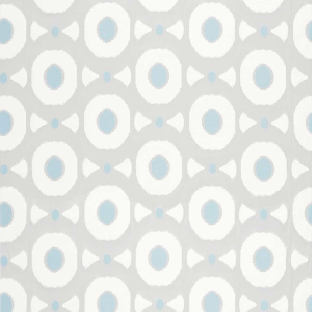 Pale grey fabric with white circular motifs and muted sky-blue centres