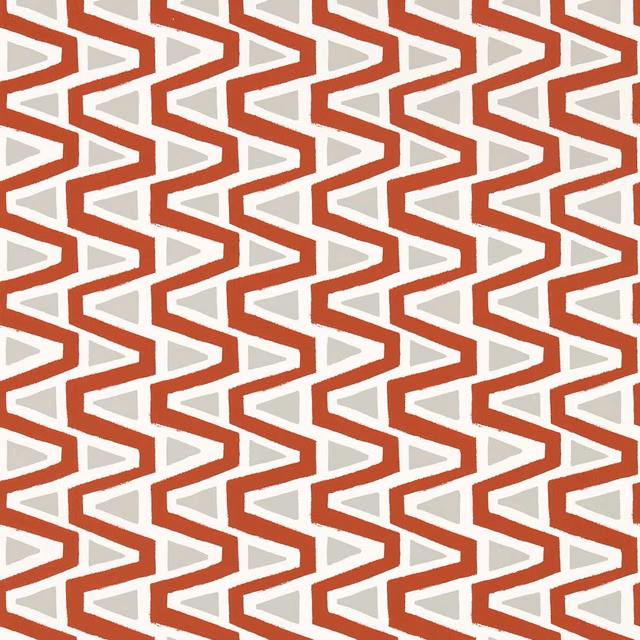 Rust-red angular zigzags with cream and pale grey inset shapes