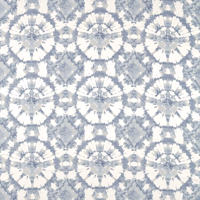 Pale blue-grey and white radial floral motifs across a repeating textile swatch