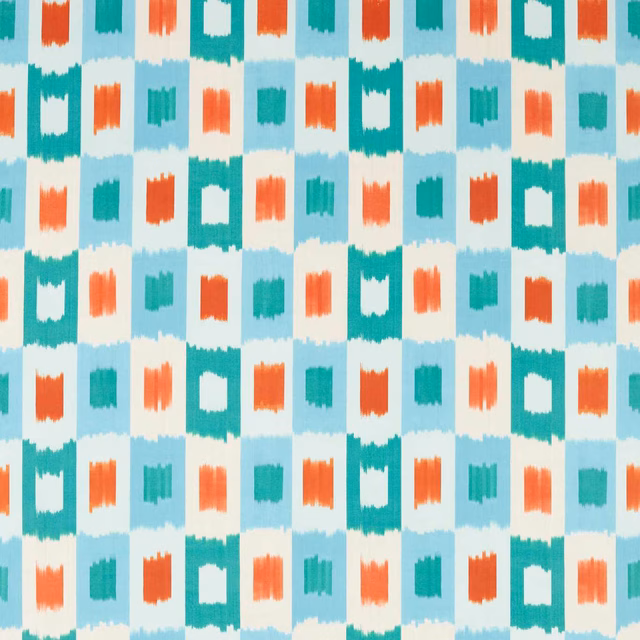 Pale aqua fabric with teal, emerald, rust and coral ikat-style geometric blocks