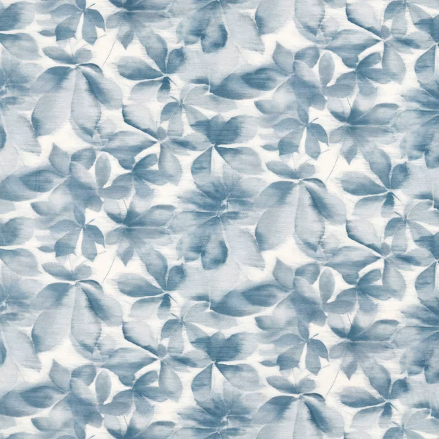 Washed blue-grey floral fabric with painterly petals on a pale ivory ground