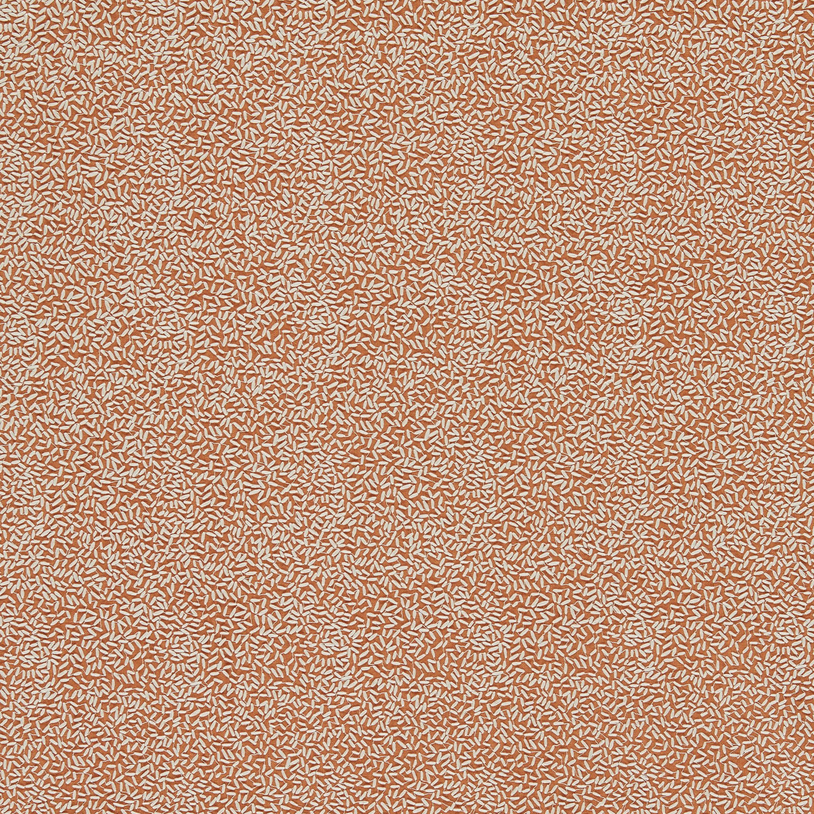 Warm terracotta fabric with dense tiny cream flecks and a softly textured woven surface