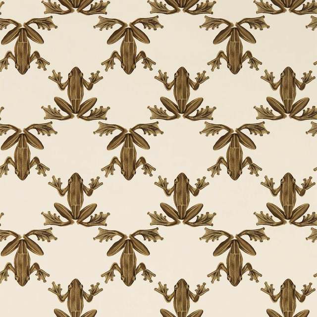 Brown-gold illustrated frogs repeating over a warm parchment wallpaper background