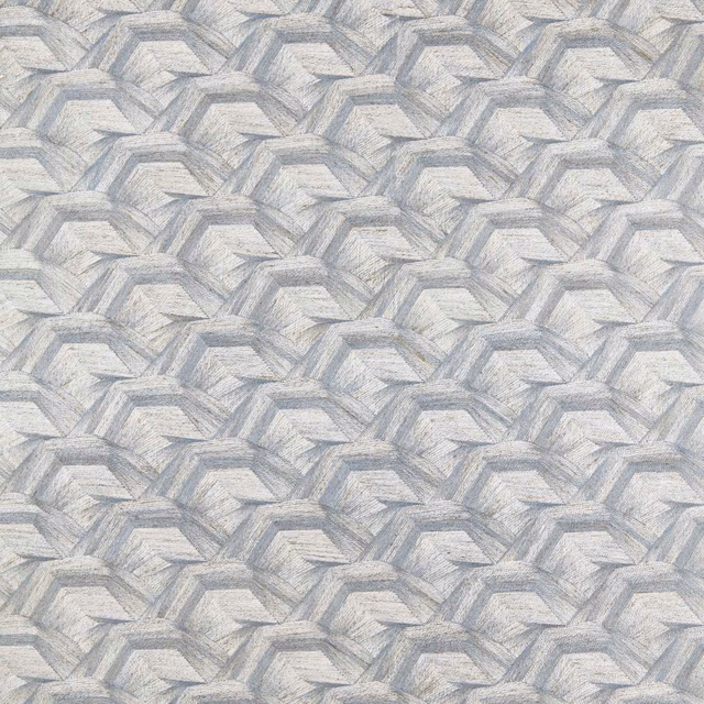 Pale blue-grey woven fabric with repeating angular, faceted geometric bands