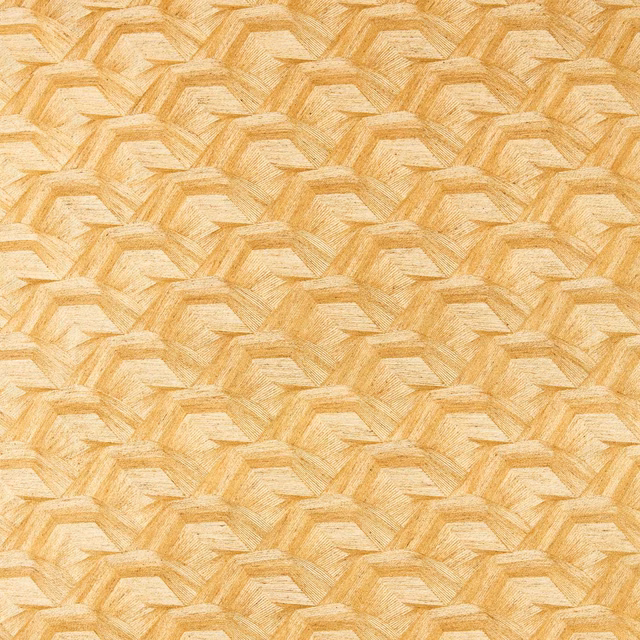 Honey-gold geometric textile with irregular stepped motifs and a tactile woven surface