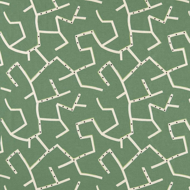 Muted jade-green textile with cream angular pathways and dark dotted accents