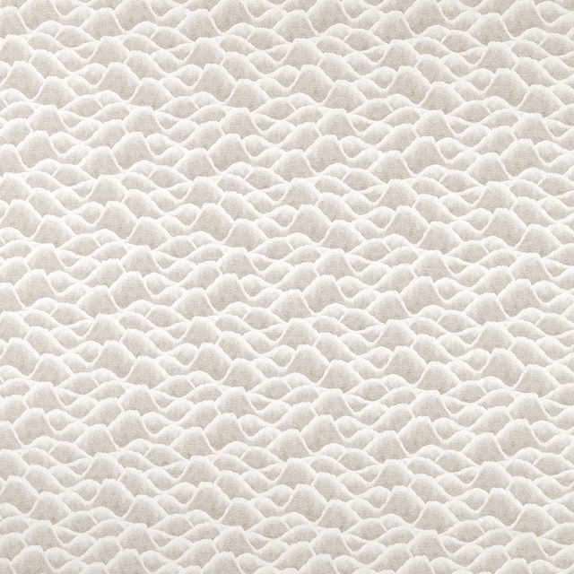Ivory-grey Zuni textile with raised overlapping scallop motifs and soft woven texture