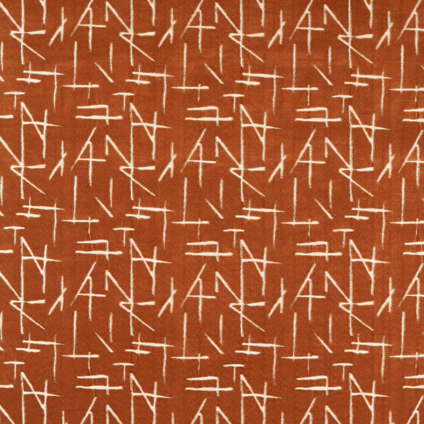 Burnt terracotta velvet with repeated ivory angular line motifs and dense textured surface