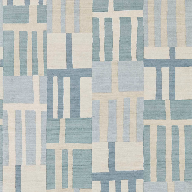 Muted sapphire-blue and limestone geometric blocks with fine horizontal striations
