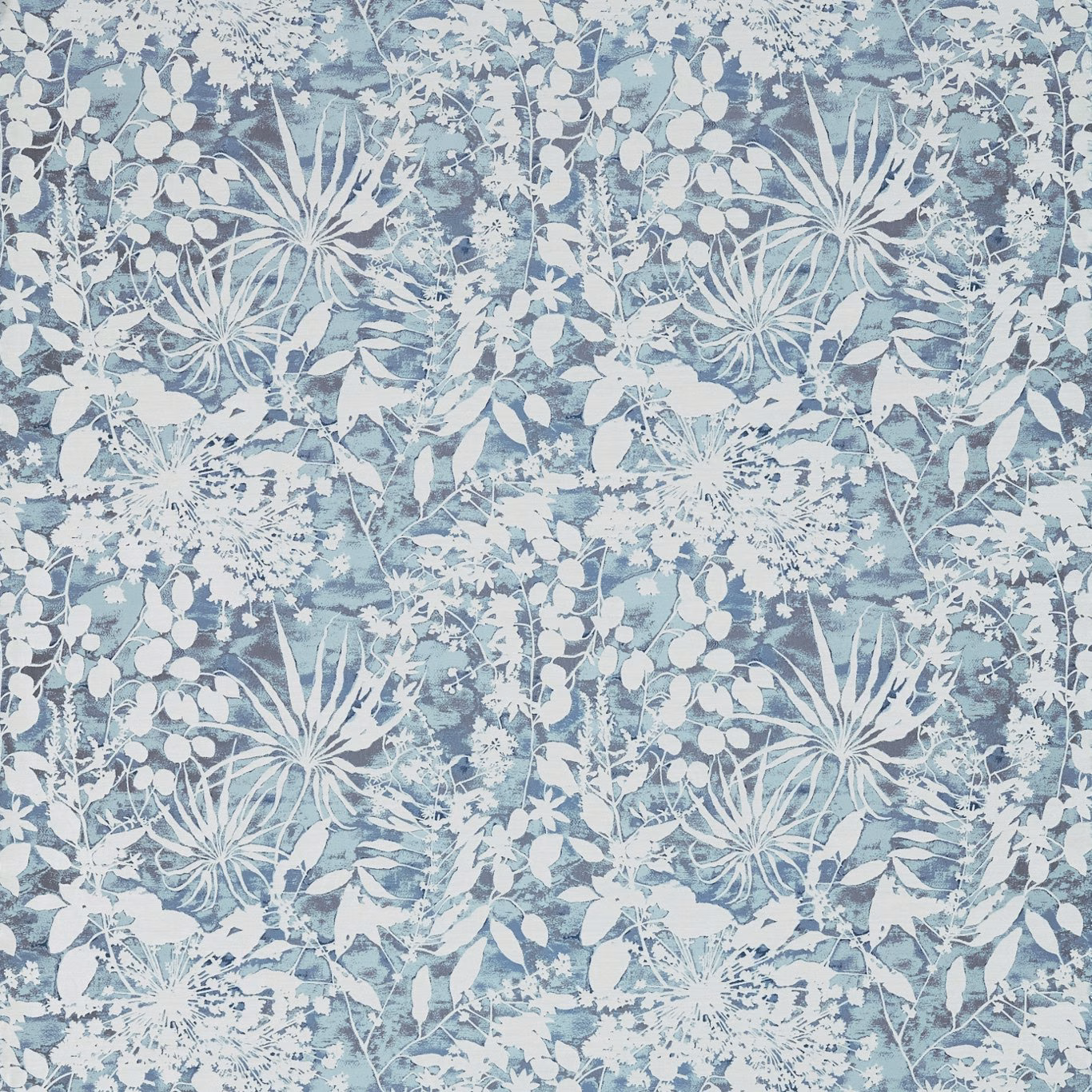 Cool blue-grey botanical fabric with chalk-white leaves and radial seedheads
