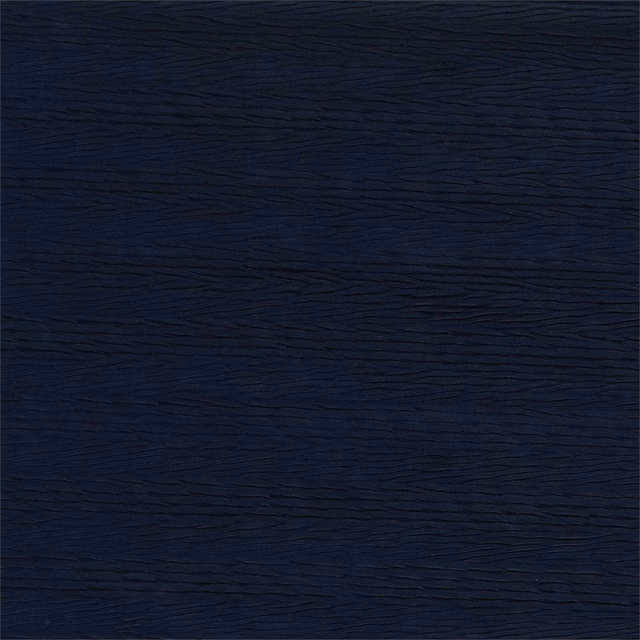 Near-black ink-blue woven ground with fine, rippling horizontal lines