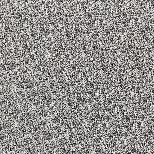 Charcoal grey and pale flecked woven textile with a dense, granular texture