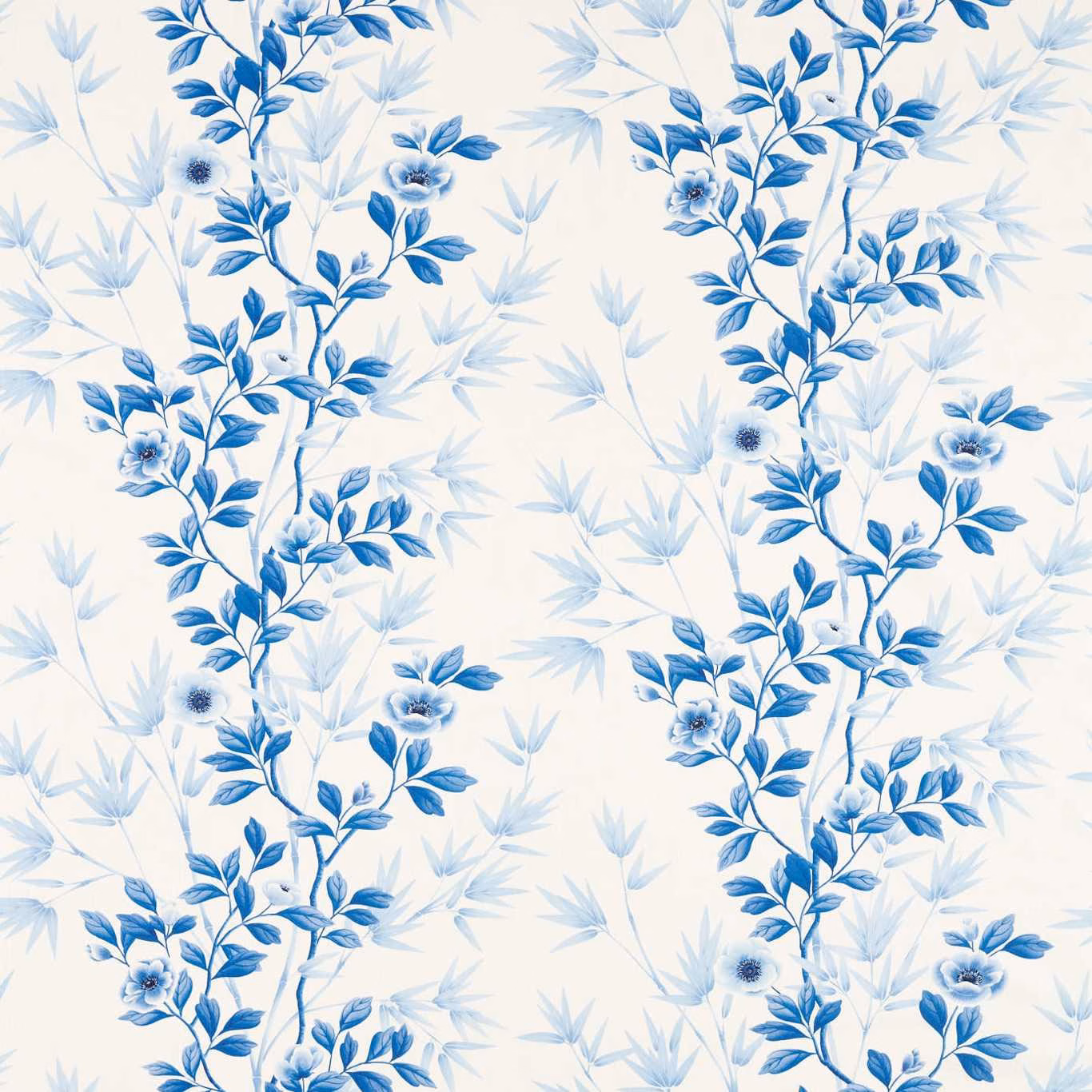Porcelain fabric with branching China-blue flowers, leaves and pale blue foliage