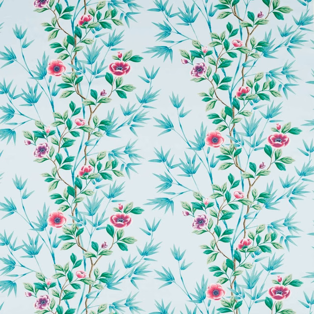 Pale aqua floral fabric with turquoise leaves and vivid magenta blossoms