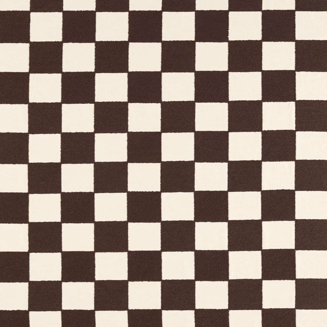 Chocolate brown and ivory woven checkerboard with gently irregular square edges