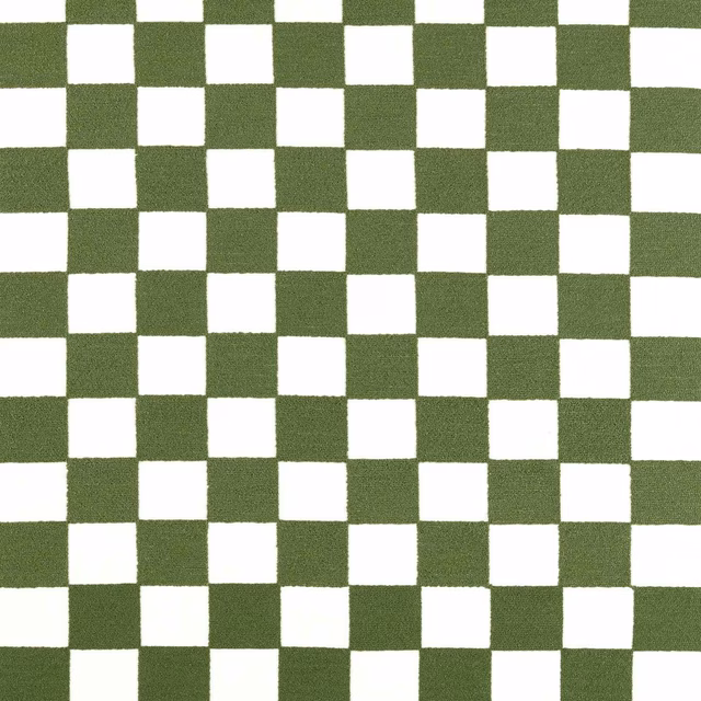 Close-up of muted matcha green and ivory woven checker fabric with fine texture