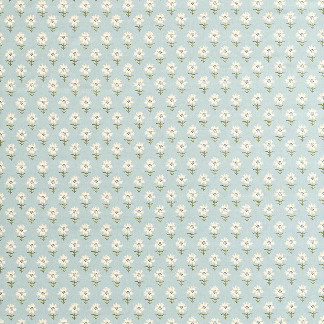 Pale blue-green fabric with repeating cream flower sprigs and fine sage stems