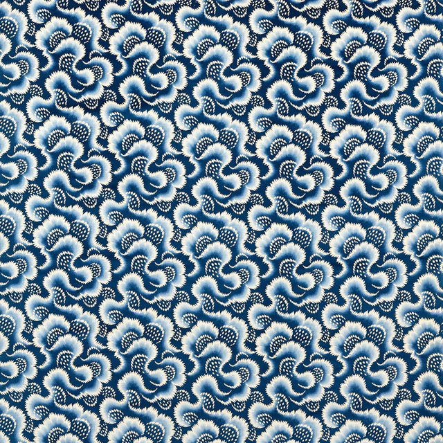 Deep Pacific blue velvet with cream-edged, densely packed curling floral motifs