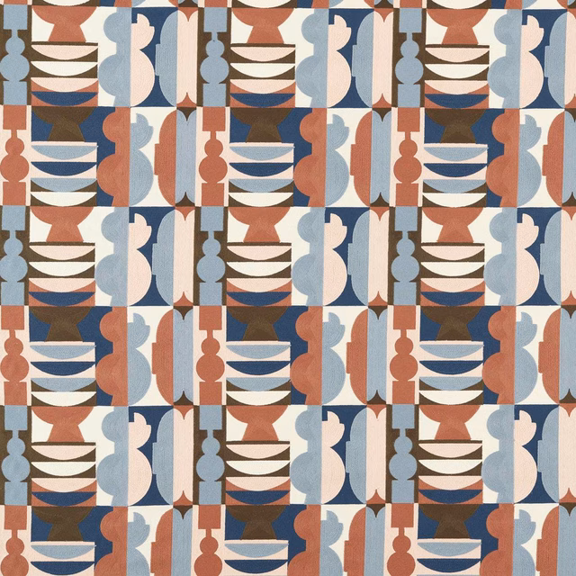 Geometric woven textile in dusty rose, pale blue, cream and deep brown