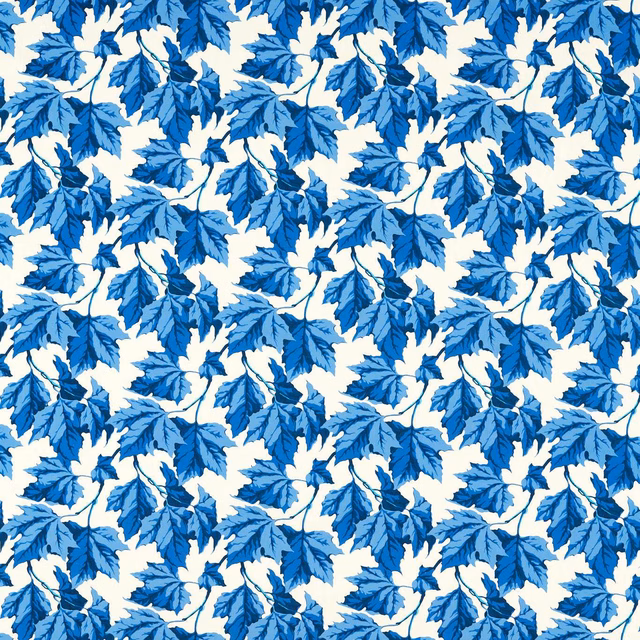 Lapis blue leafy botanical fabric with crisp white ground and overlapping foliage
