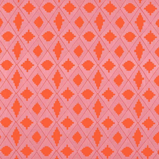 Ruby-red geometric floral motifs in a rose trellis weave