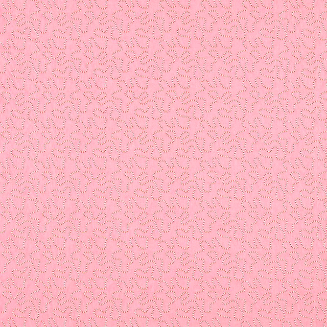 Warm rose-pink textile with dense ruby wiggle motifs and a finely textured woven surface