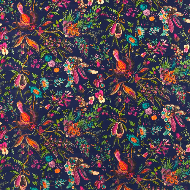 Jewel-toned floral velvet with emerald foliage and vivid blooms on a midnight-blue ground