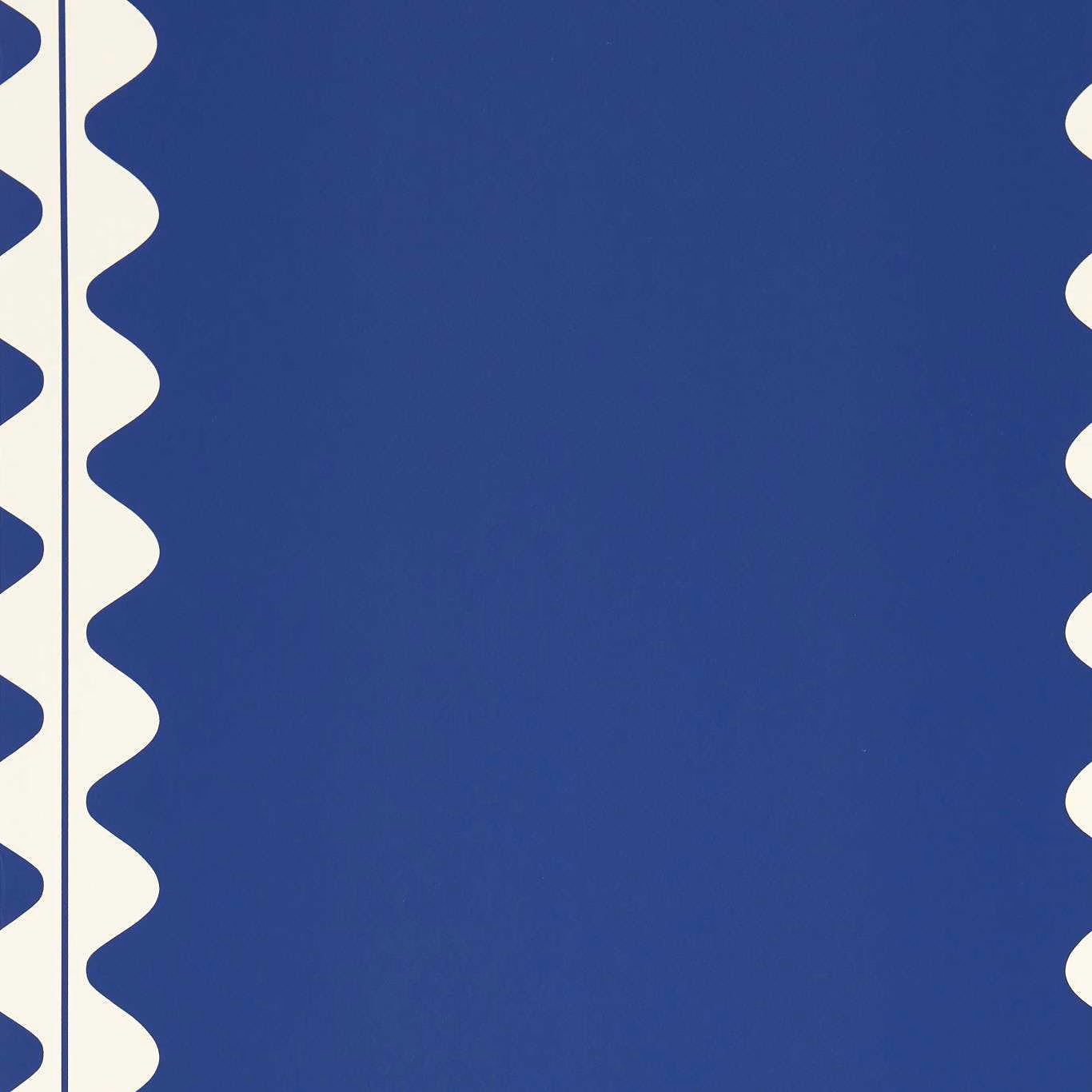 Saturated lapis-blue wallpaper with ivory scalloped vertical bands and subtle surface variation