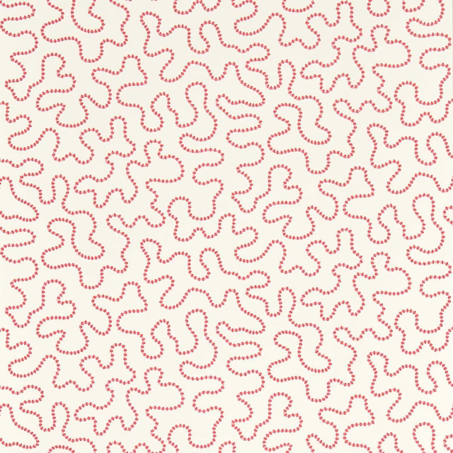 Rose-pink dotted wiggle lines forming irregular loops on a warm cream wallpaper ground