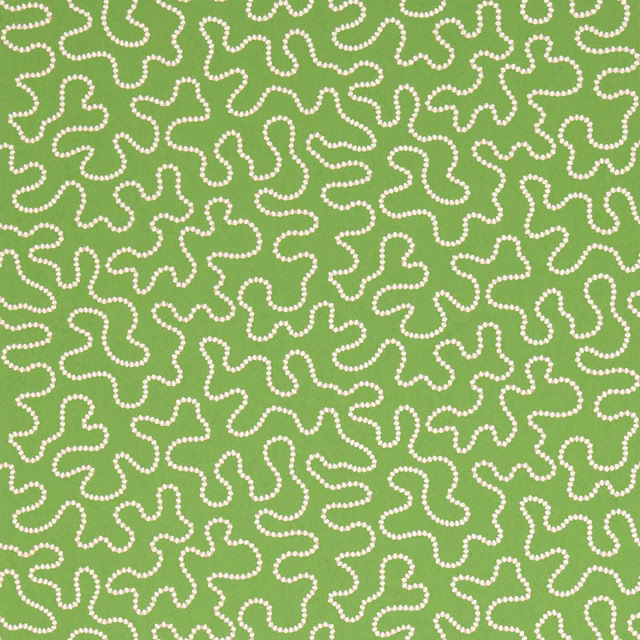 Peridot green wallpaper with ivory dotted organic squiggles in a dense repeating pattern