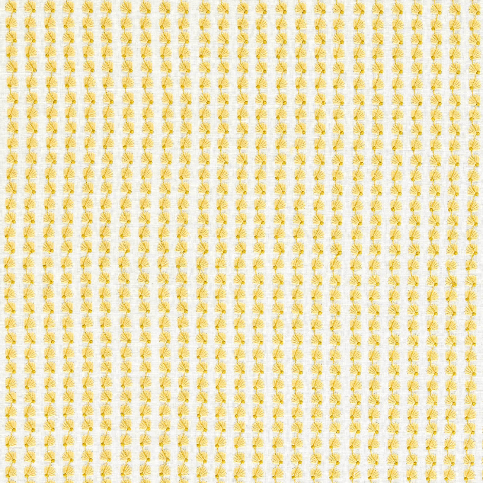 Cream woven fabric with tiny vertical honey-ochre sunburst motifs