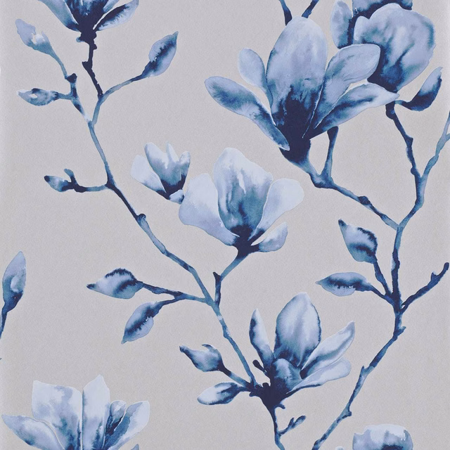 Watercolour indigo flowers and branches on a pale blue-grey wallpaper ground