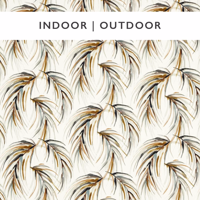 Warm cream fabric with sweeping slate, honey and topaz palm-like fronds