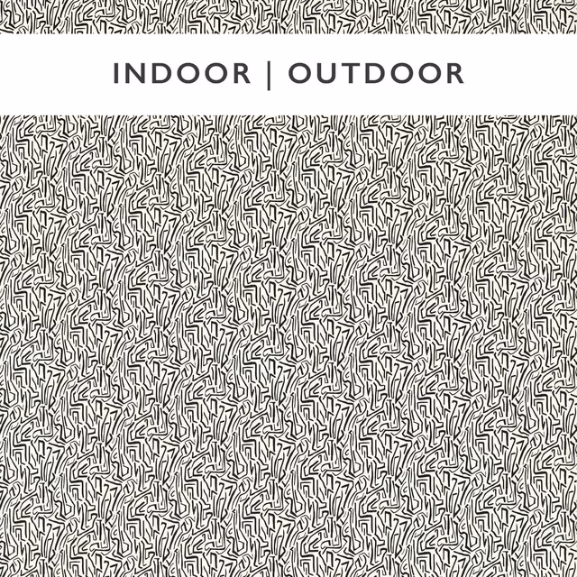 Dense black origami-like linework over a warm ivory-grey ground