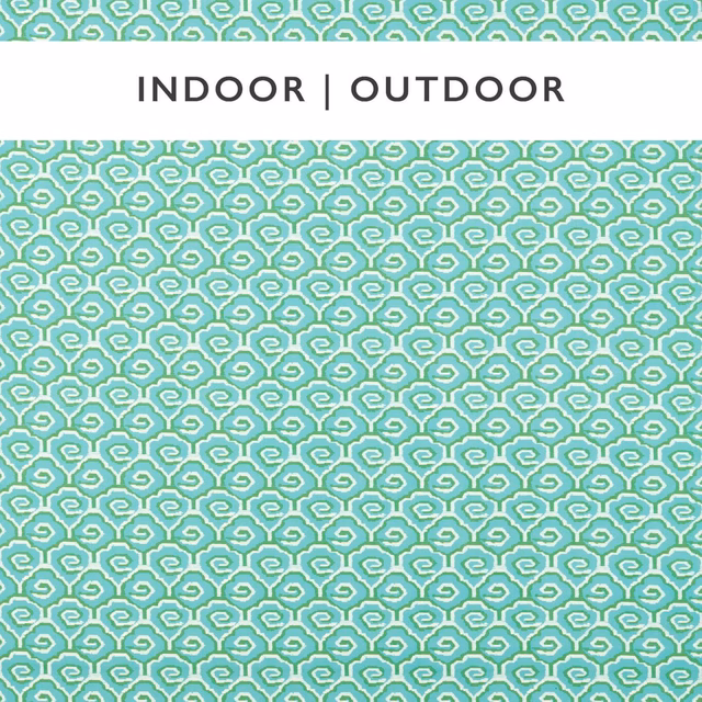 Cool mint and kelly-green textile with dense cream curled geometric motifs