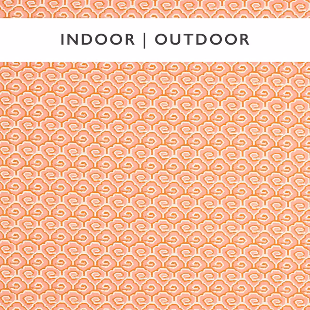 Warm paprika outdoor fabric with dense cream looping geometric motifs and fine textile grain