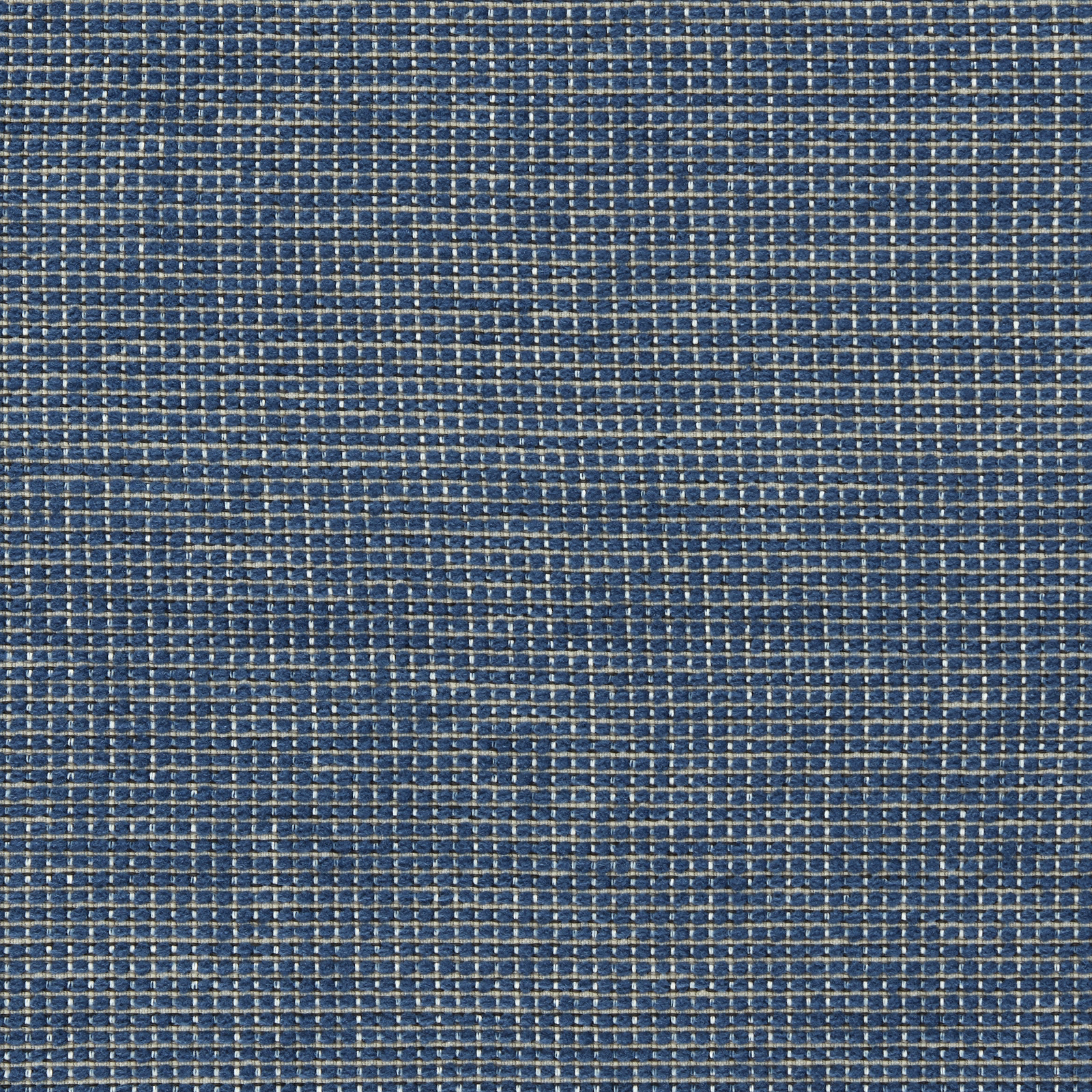 Deep indigo and ivory outdoor weave showing a fine tactile grid