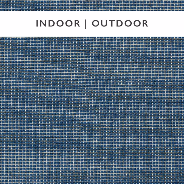 Deep indigo and ivory outdoor weave showing a fine tactile grid