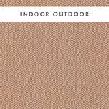 Warm rust and chalk woven fabric with a small interlocking diamond lattice