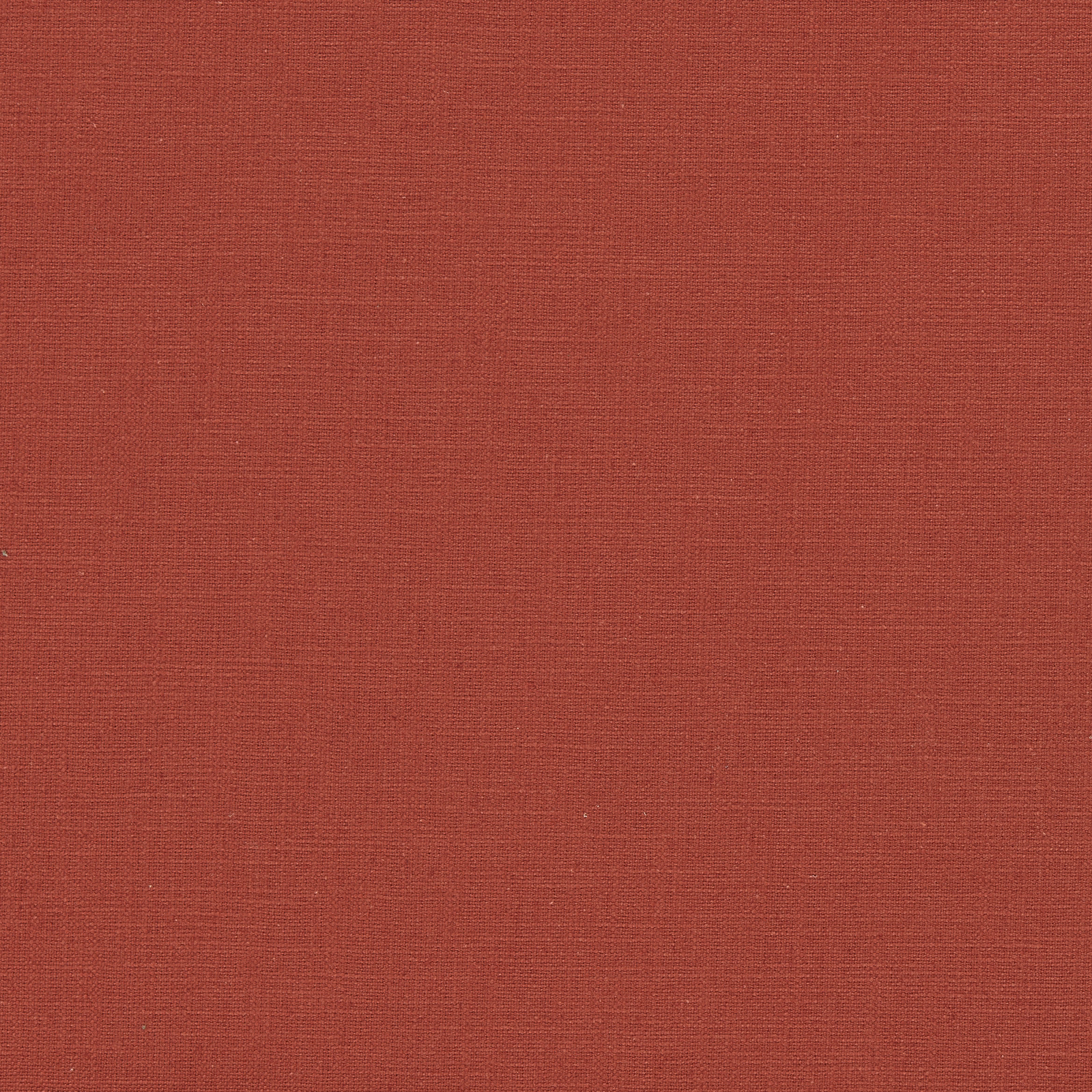 Close-up of muted scarlet red fabric with a fine crosshatched woven texture