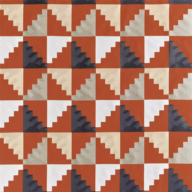 Terracotta, oyster and charcoal stepped geometric weave with a tactile pixel-like surface