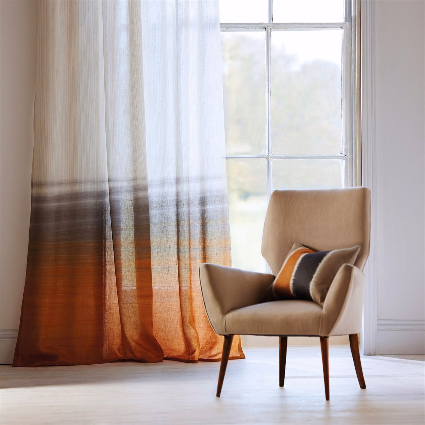 Sheer parchment curtain with fine vertical weave fading into warm spice