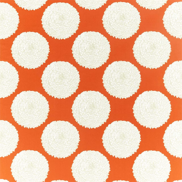 Cayenne-orange textile with ivory scalloped circles and a softly textured woven surface