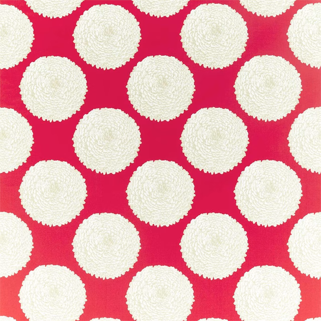 Vivid tulip-pink fabric with ivory textured, scalloped circular motifs in a regular repeat