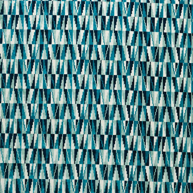 Ink and azure teal geometric woven triangles with pale aqua and white highlights